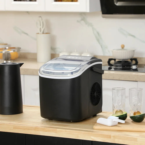 Black portable ice maker on kitchen counter with open clear top lid