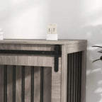 Walnut-brown dog crate furniture close-up of front latch and side slats