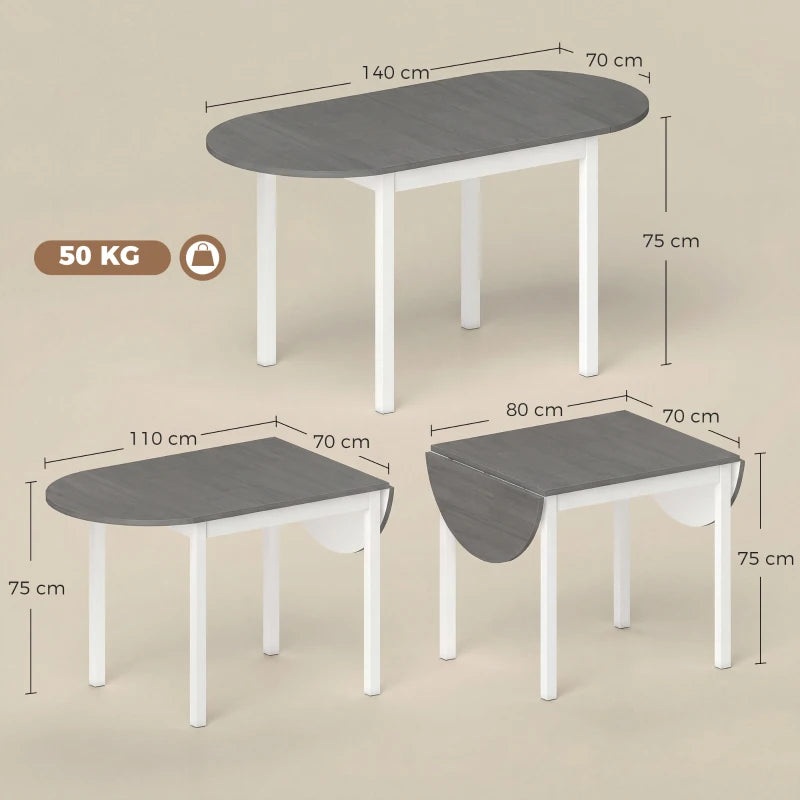 Grey drop-leaf wooden dining table with white legs and curved grey top