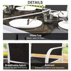 Close-up of glass-top outdoor table and black mesh chairs with armrests