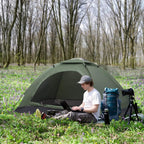 Dark green 2-person camping tent with zippered entry, mesh window, and guy lines