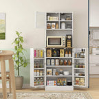 White kitchen storage cabinet with glass-front cabinet, microwave and food jars on shelves