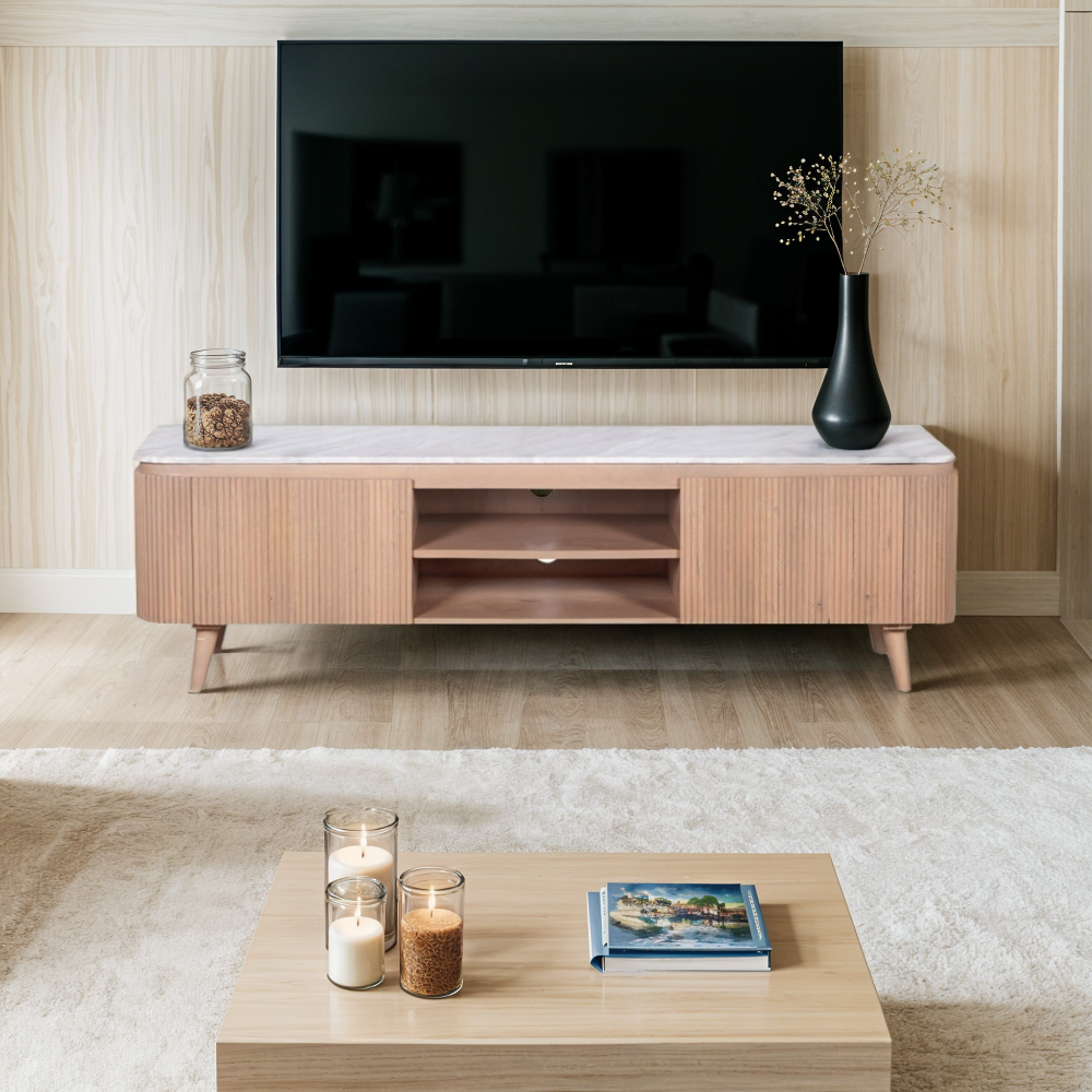 Wooden TV stand with marble top in a living room setting.