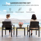 Black bistro table and two matching chairs with slatted backs and seats