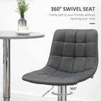 Grey tufted swivel bar stool with 360° rotating seat and cushioned backrest