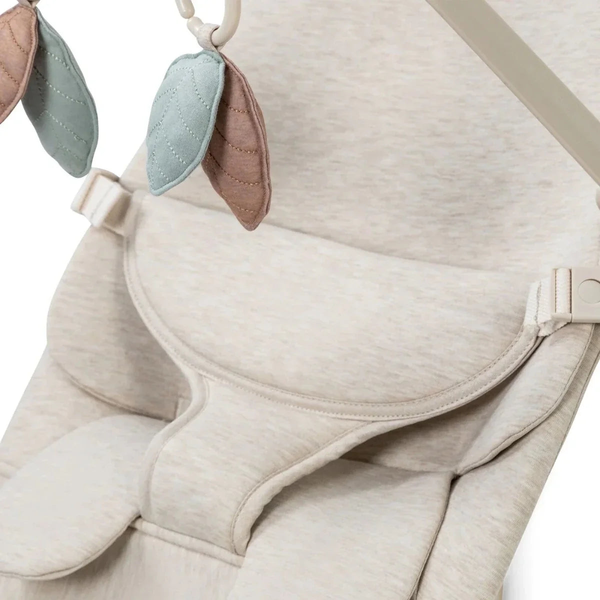 Oatmeal bouncer with side harness and suspended leaf toys