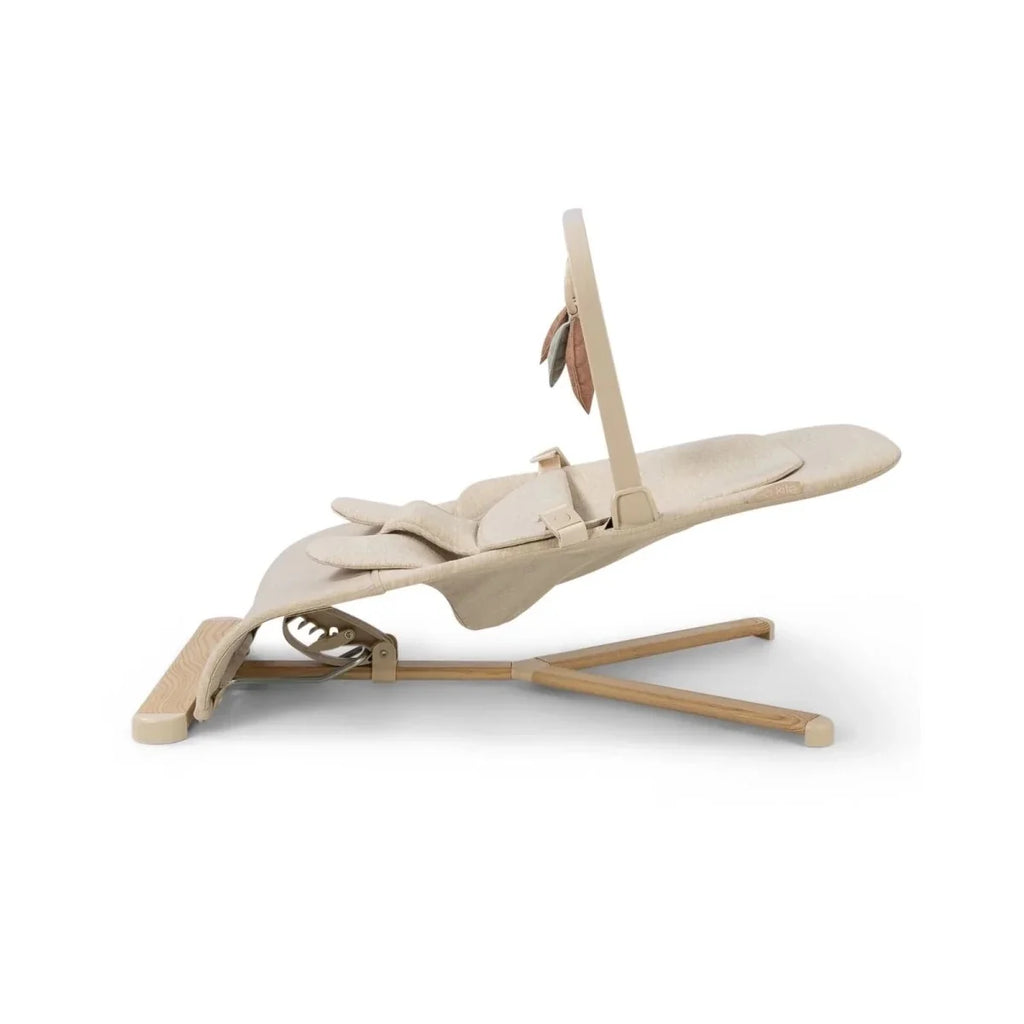 Oatmeal baby bouncer reclined with wooden base runners