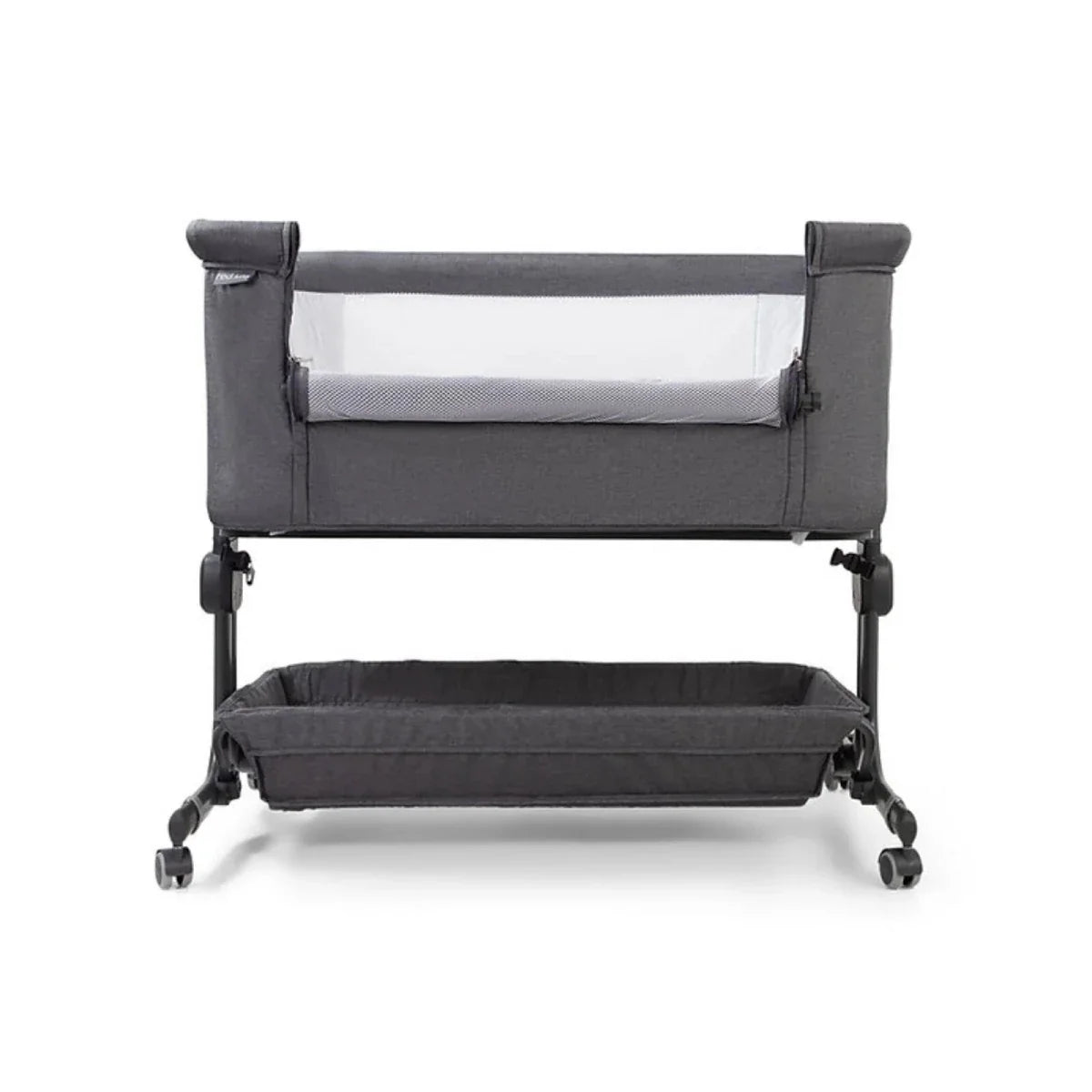 Grey fabric bedside crib with padded rail and adjustable legs