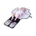 Red Kite travel changing mat, dark blue with white pad and front wipe pocket