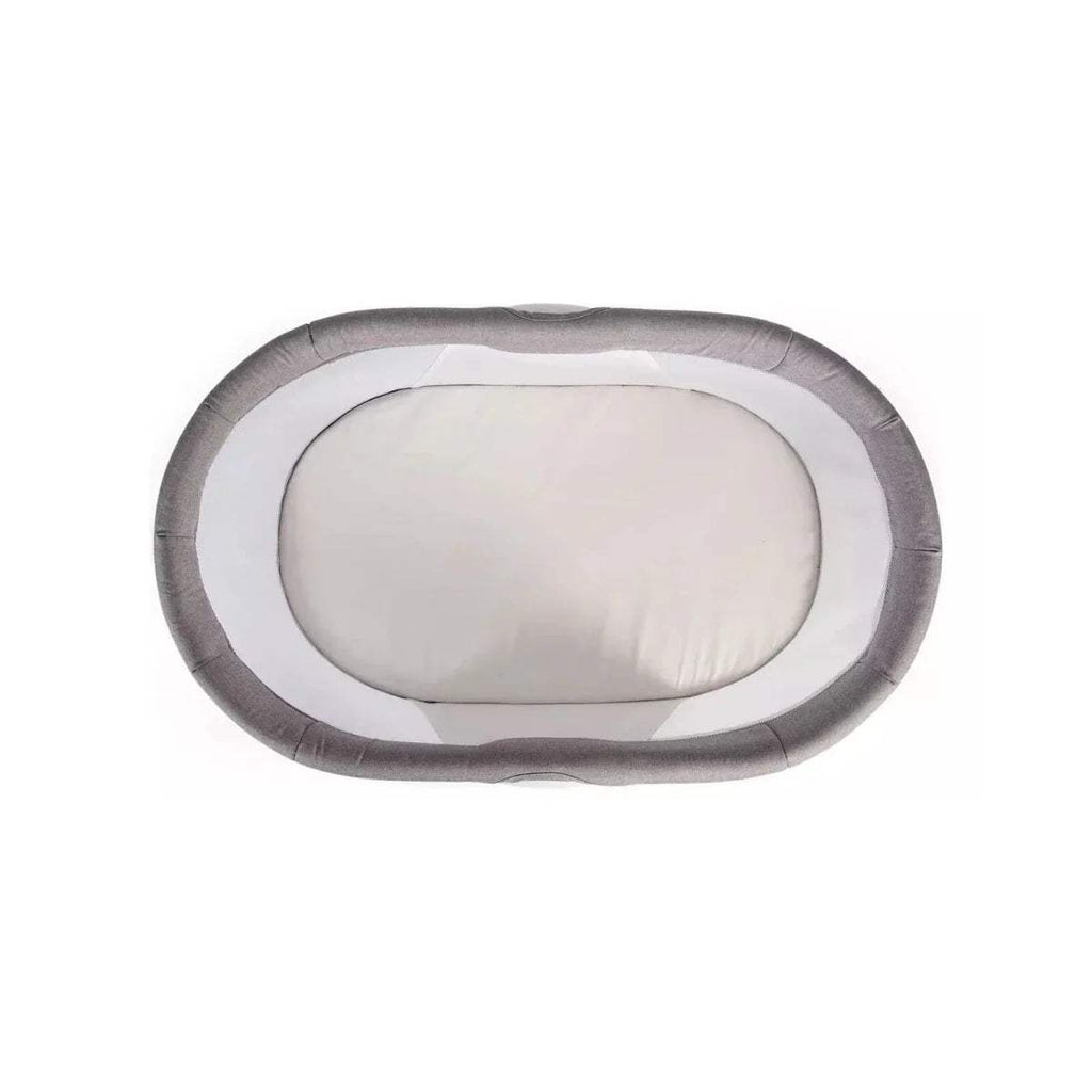 Grey padded oval mattress insert with white inner surface.