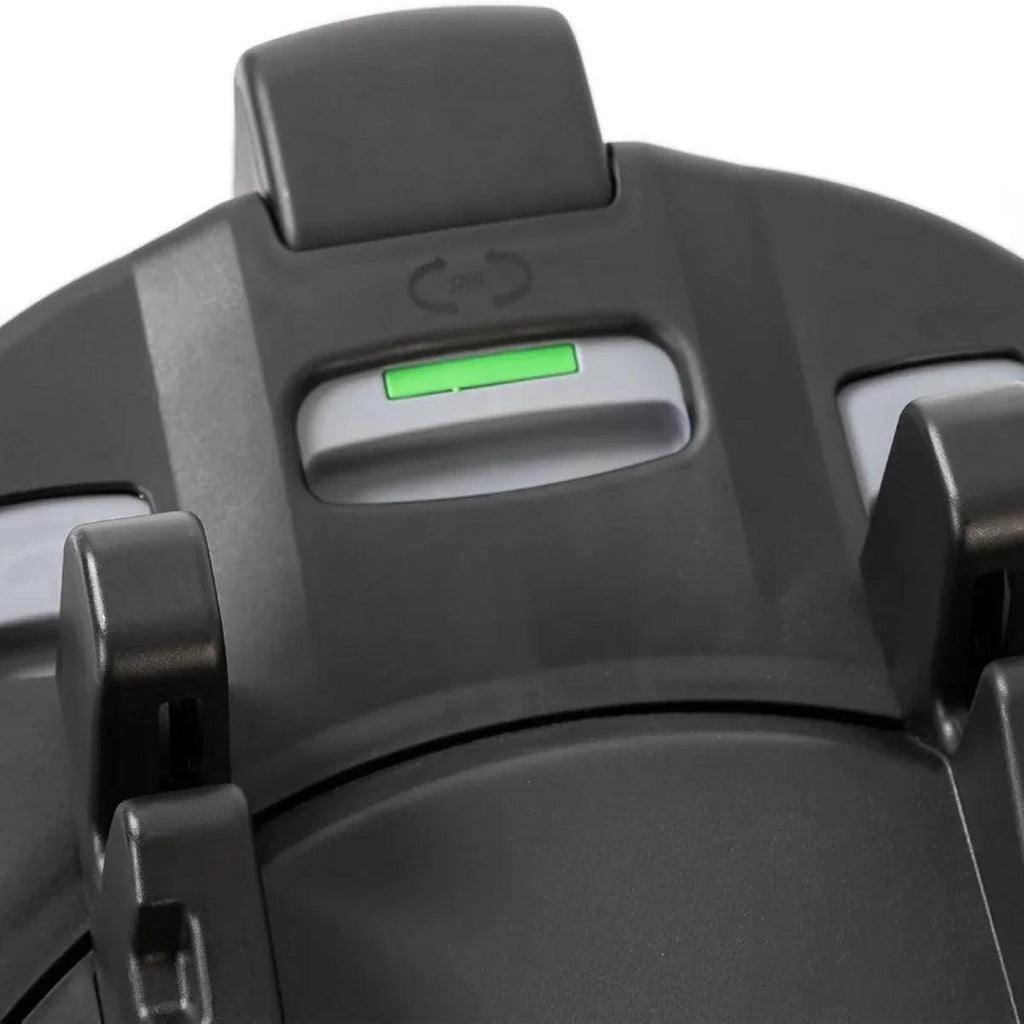 Black ISOFIX base with control panel showing green status indicator