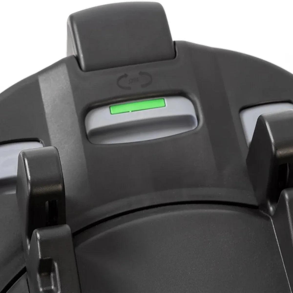 Black ISOFIX base with control panel showing green status indicator