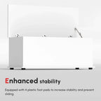 White storage chest base with four plastic foot pads and open flip-top lid.