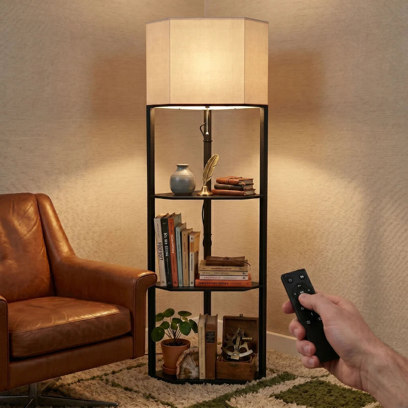 Black floor lamp with lit fabric shade, three shelves, and remote control