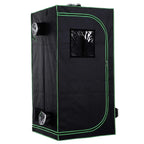 Black grow tent with reflective interior and green-lined viewing window, side vents