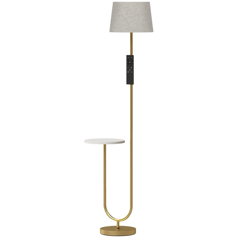 Gold-tone floor lamp with linen drum shade and round side shelf