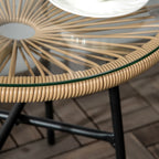 Close-up of beige woven rattan edge with clear tempered glass tabletop