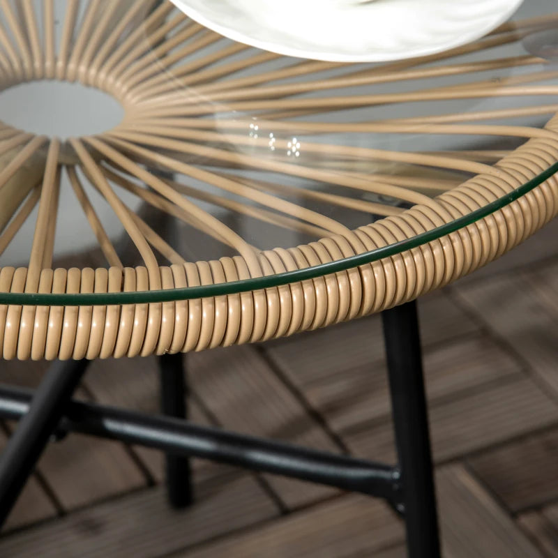 Close-up of beige woven rattan edge with clear tempered glass tabletop