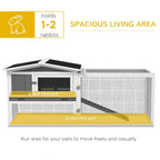 Grey rabbit hutch with spacious living area, wire mesh panels, ramp and black interior base