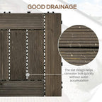 Charcoal grey wooden decking tiles with visible drainage gaps between slats