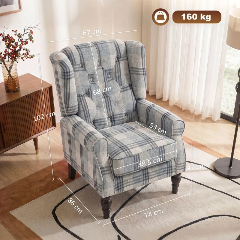 Plaid wingback accent chair with cushioned seat, wing arms, and dark turned legs