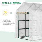 Green-framed walk-in greenhouse with roll-up zip door and black crossbar supports, clear mesh