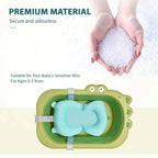 Green baby bath tub with blue cushion and securing straps, open view