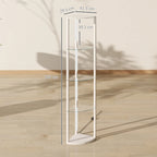 White standing LED lamp with three-tier glass shelves, foot pedal base, side view