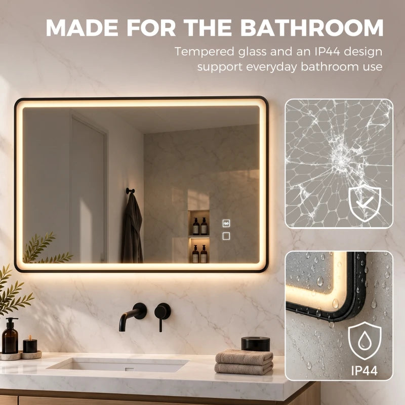 Black rectangle LED bathroom mirror with warm light edge and water protection icons