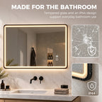 Black rectangle LED bathroom mirror with warm light edge and water protection icons