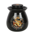 Black cauldron-style wax melt burner with dragon illustration and round lid