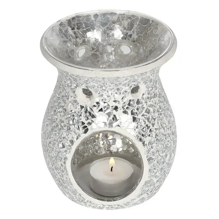 Silver crackle wax warmer oil burner with circular glass cutout and lit tea light