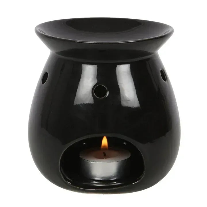 Black ceramic wax melt burner with central opening and small tealight flame