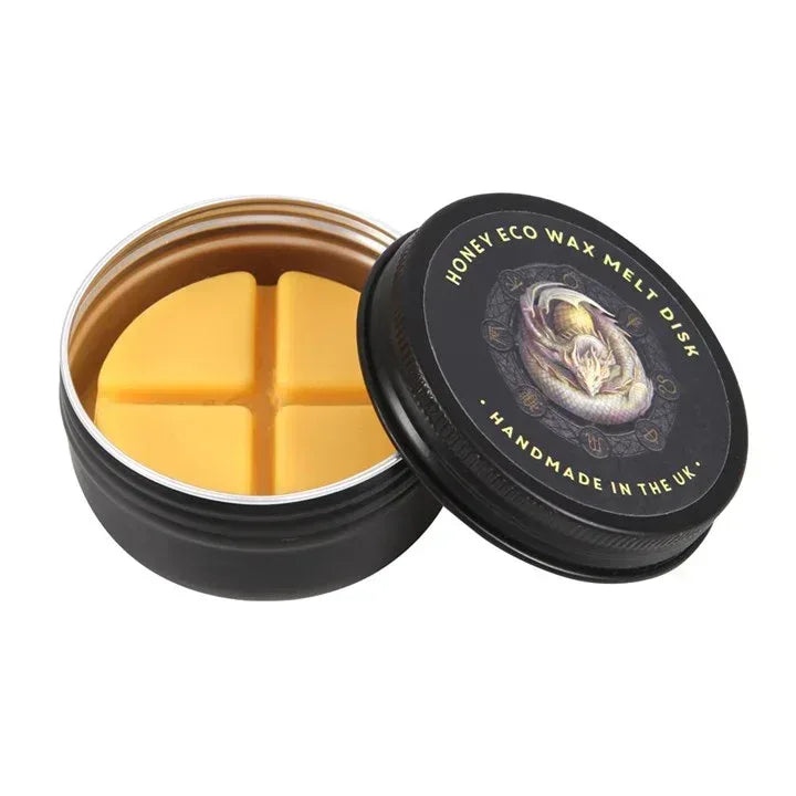 Black wax melt pot with lid, showing yellow wax and dragon graphic