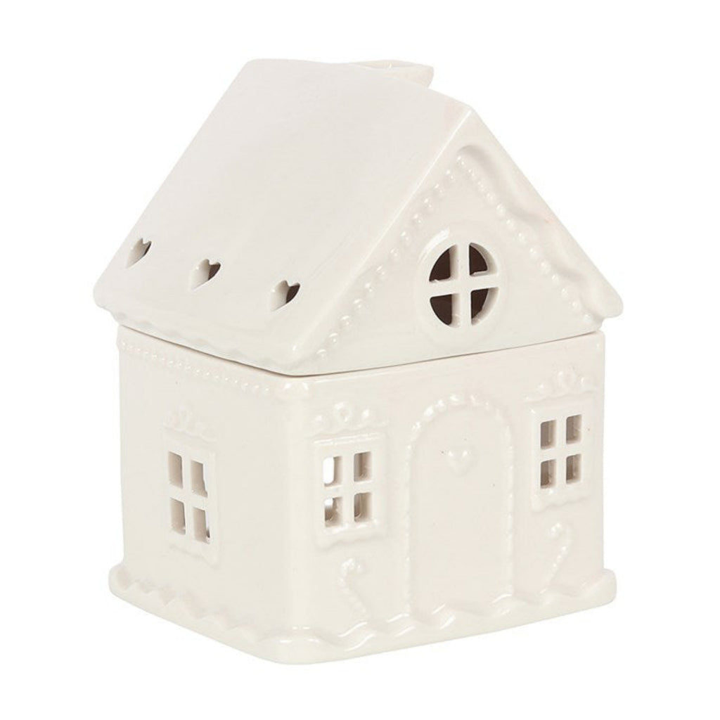 White ceramic house-shaped lantern on a white background