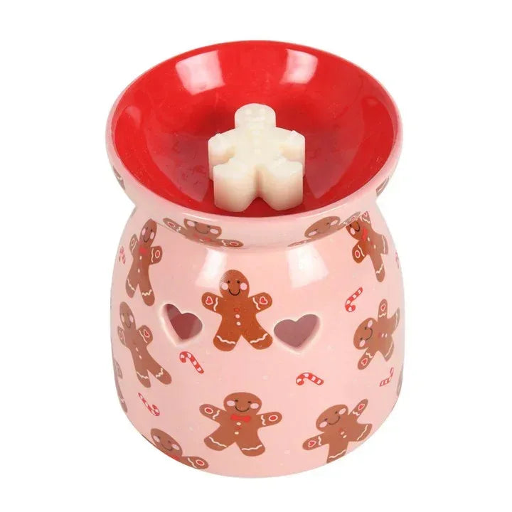 Gingerbread wax melt burner with white wax candle on red interior, pink sides