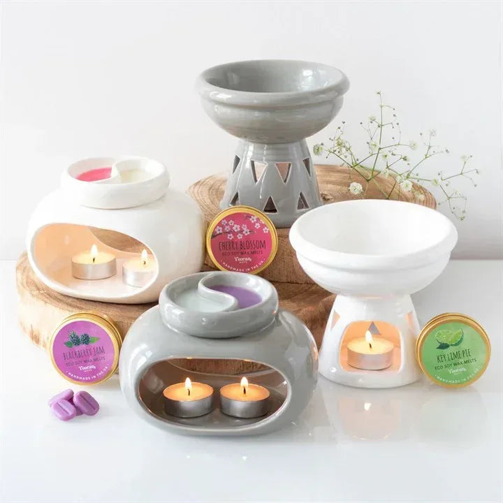 Set of wax warmers and tea lights, including off-white deep bowl oil burner with cut-outs