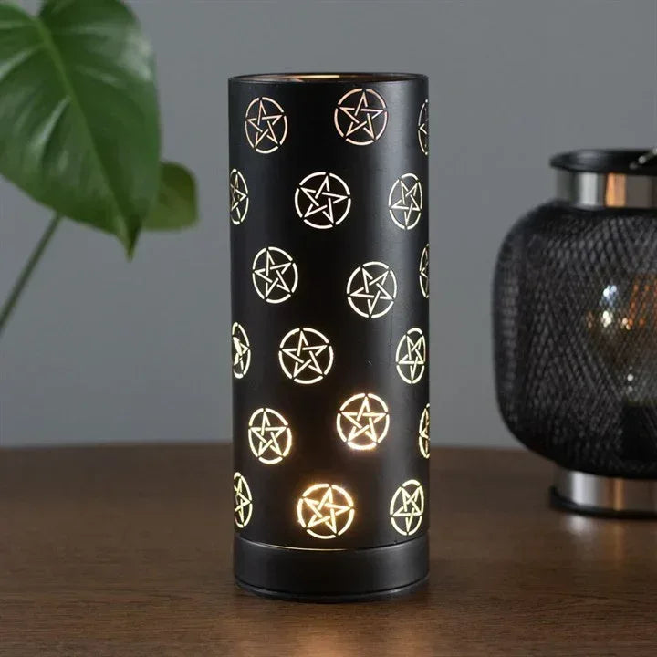 Black aroma lamp cylinder with lit pentagram symbols, base and rim