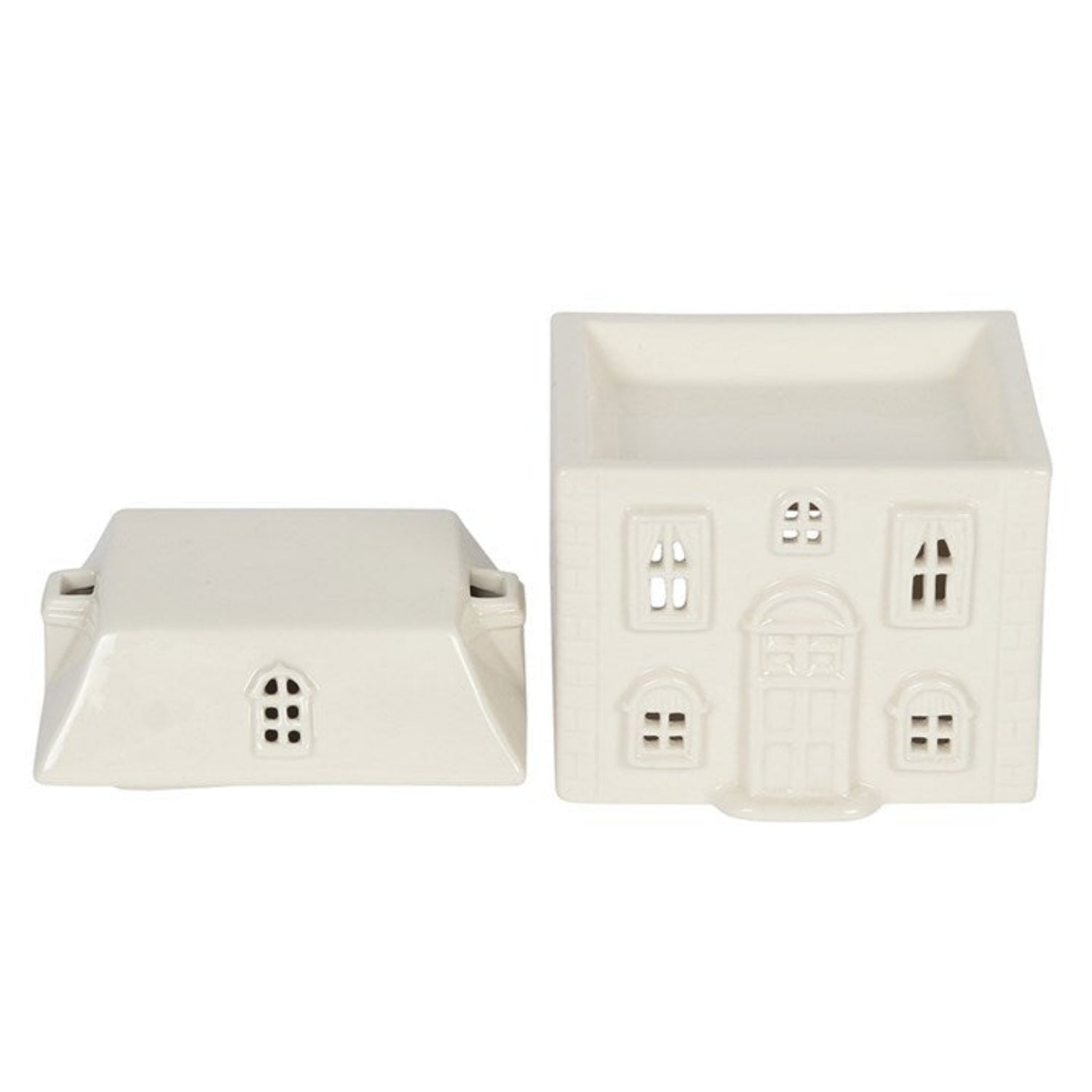 Two white ceramic house-shaped planters on a white background