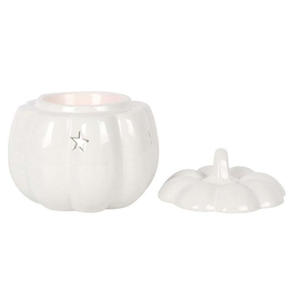 White ceramic jar with a star design and lid on a white background