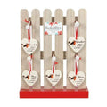Set of 30 robin ceramic hanging decorations with red strings and heart tags on wooden picket
