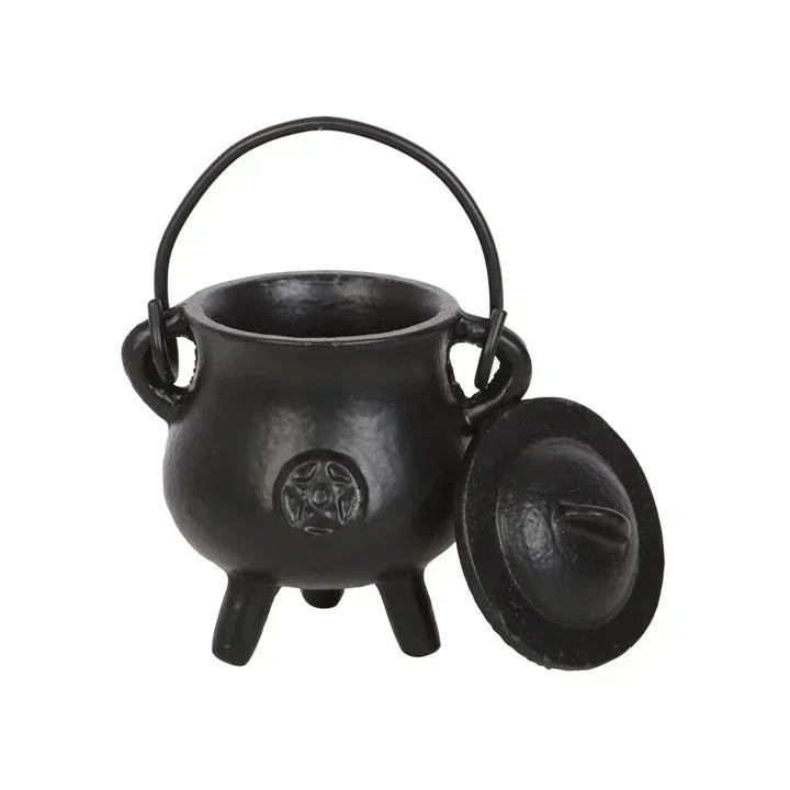 Small black cast iron cauldron with pentagram seal, loop handle, three legs, side view