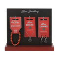 Rose jewelry set display: red beaded bracelet, rose necklace pendant, rose earrings