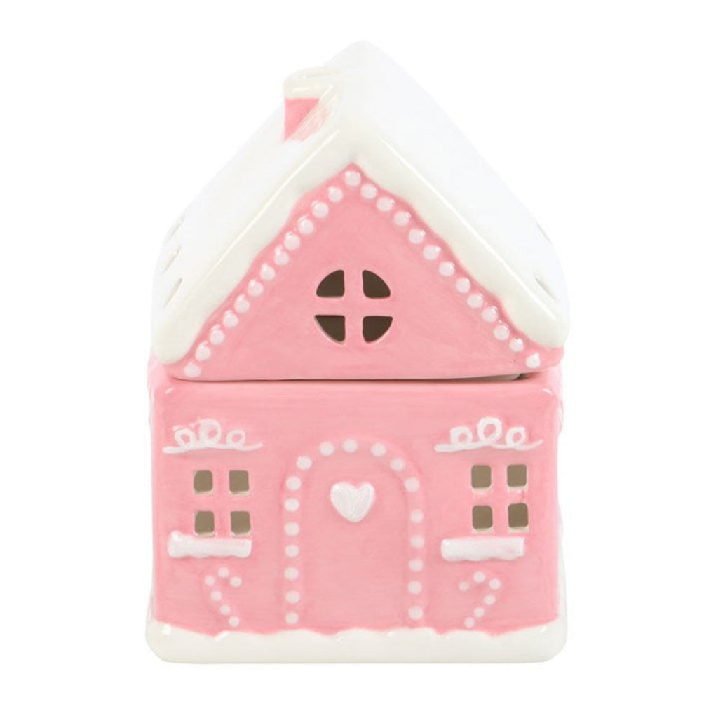 Pink house-shaped container with white accents on a white background