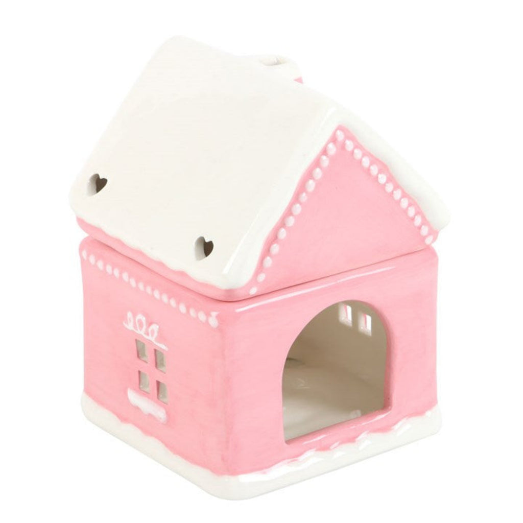 Pink pet house with white roof on a white background