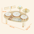 Wooden baby drum kit with three drums, cymbals, and xylophone on round table, 39.5 cm