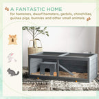 Grey wooden hamster cage with open top, hut, and ramp inside on large base