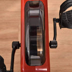 Close-up of the red bike console with clear LCD window and surrounding console panel