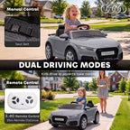 Grey ride-on electric car with child seated and open cockpit front seats