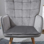 Grey wingback armchair front view with cushioned seat, winged arms, and wooden legs